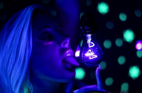Samantha Saint and her lesbian girlfriend show pretty faces in black light 45043732