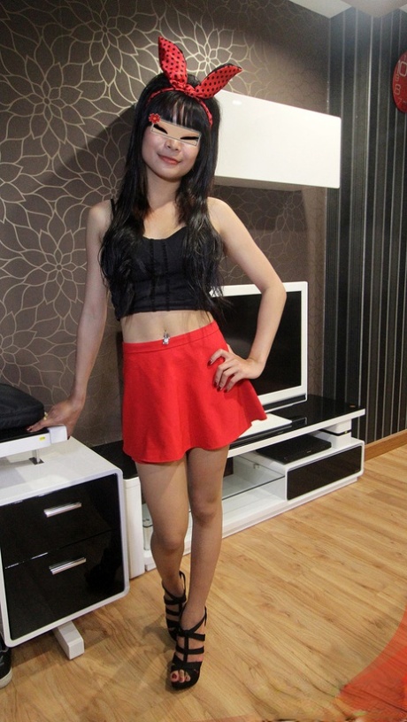 Petite Thai girl Nika sports a creampie after POV sex on a bed 44267840