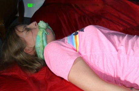 White girl is hogtied and cleave gagged while wearing nylon shorts 87358254