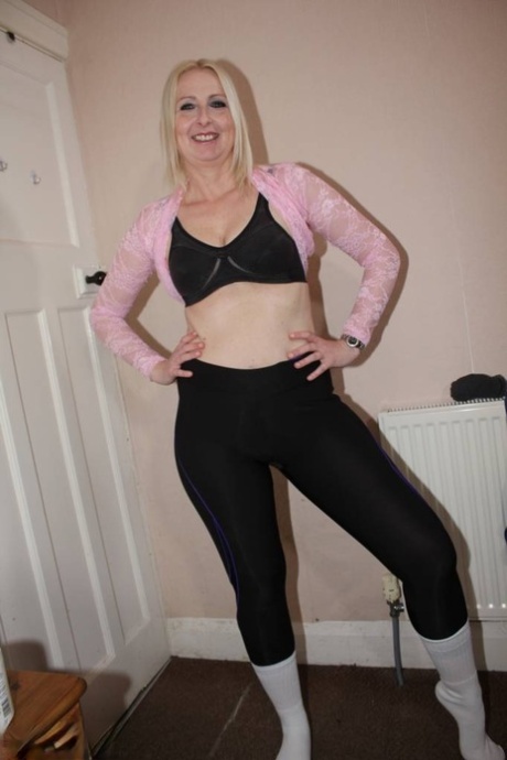 Blonde British woman Tracey Lain strips to white socks before a POV fuck 76885450