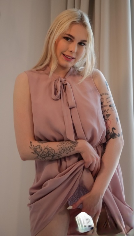 Beautiful blonde Mimi Cica reveals a pierced nipple before showing her vagina 21459948