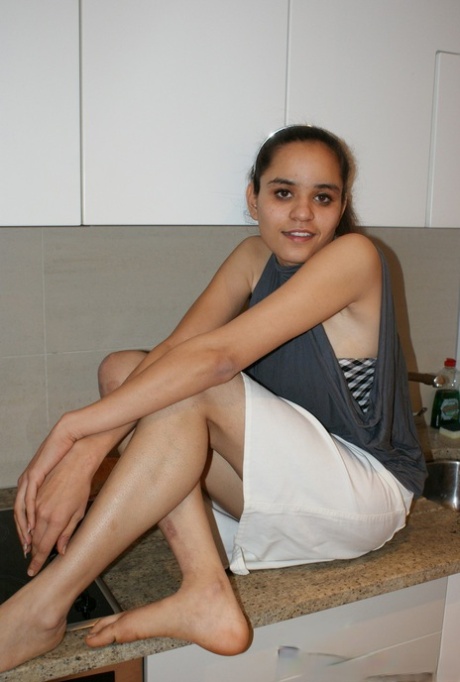 Indian solo girl Jasmine adjusts her tube top while barefoot in a skirt 61873345